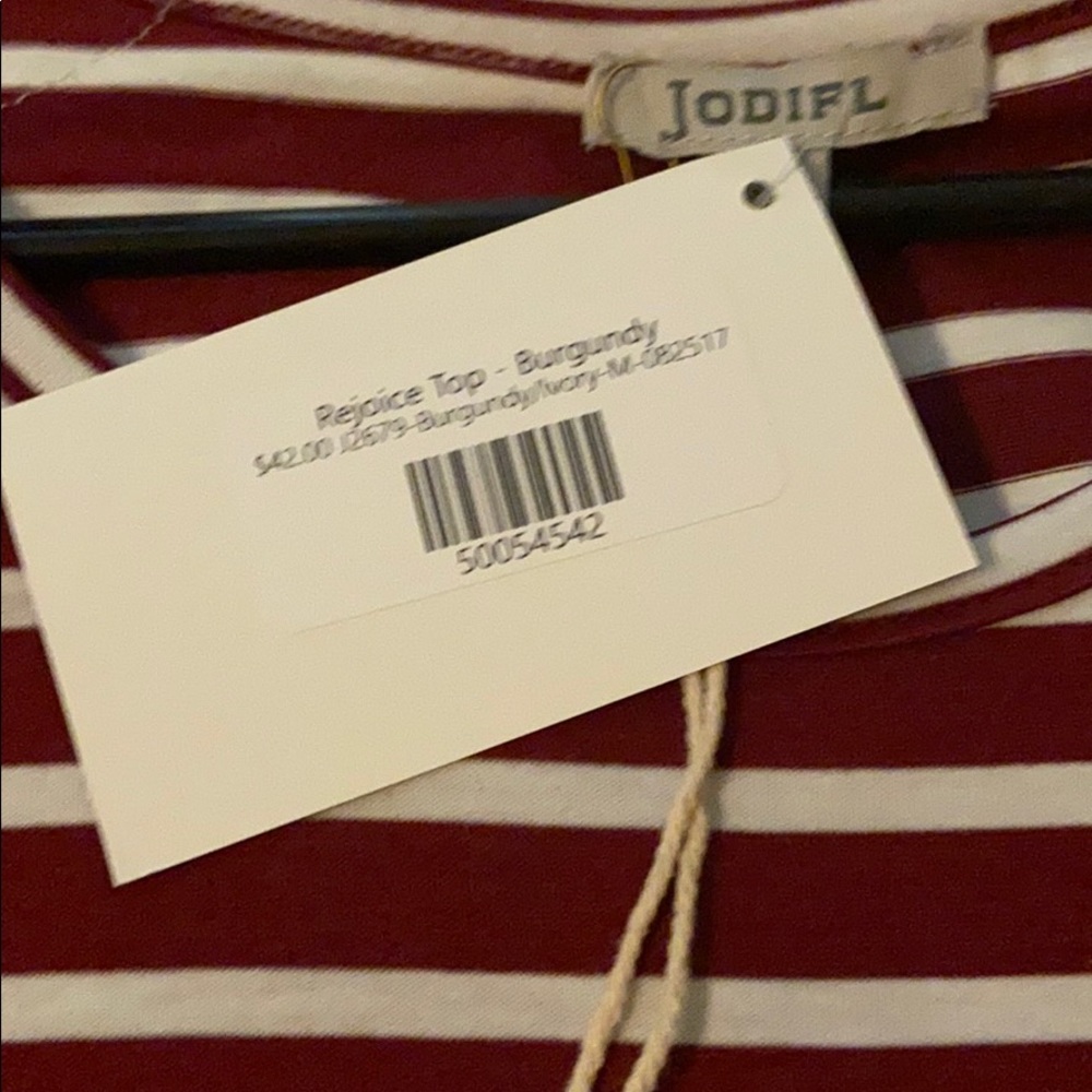 Red and white striped top with lace accent. - Picture 2 of 6